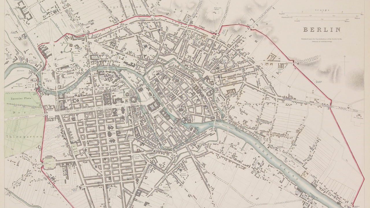 19th-century map of Berlin, highlighted in red with details of streets and the River Spree, including the label "BERLIN.