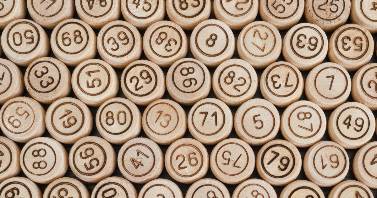 Rows of numbered wooden pieces on a white background, ranging from single digits to high numbers.
